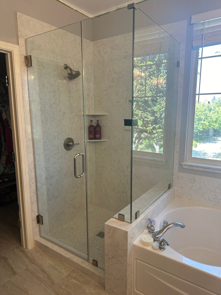 Full bathroom remodel with porcelain shower walls and tile flooring