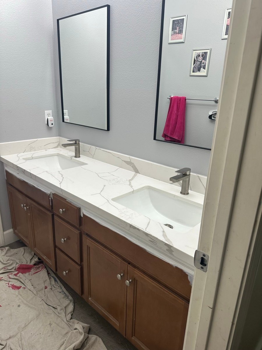 Bathroom vanity with a quartz top and sink