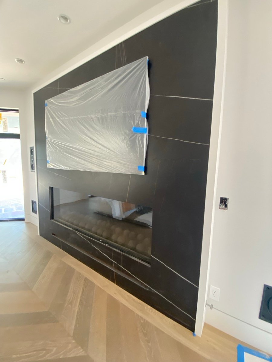 Stone fireplace surround installation
